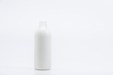 Milk bottle isolated on white background