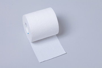 Toilet paper roll isolated on gray background