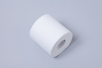 Toilet paper roll isolated on gray background
