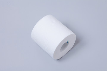 Toilet paper roll isolated on gray background