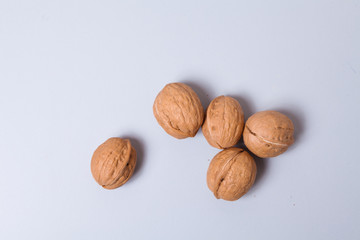 Walnuts on gray background