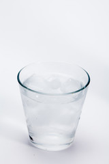 Cold ice water on white background