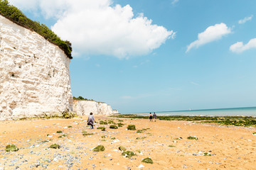 Vast seaside sandy beach walk