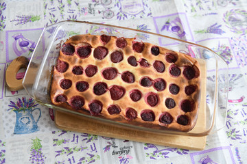 strawberry pie out of the oven. Fresh strawberry pie baked in oven. Sweet homemade pastry with fruits in mold. Vegetarian food.