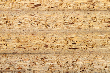 Particleboard with veneer is cut into small pieces. Materials for carpenters to build furniture.