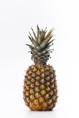 Fototapeta premium Green whole pineapple isoalated on white background