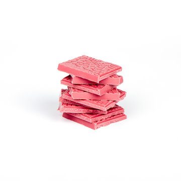 Ruby (pink) chocolate, isolated on white background