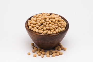  Soybean in wooden bowl on white background