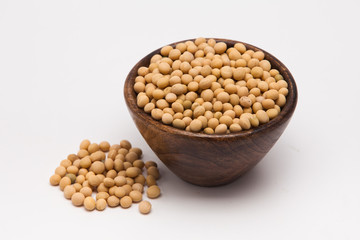  Soybean in wooden bowl on white background