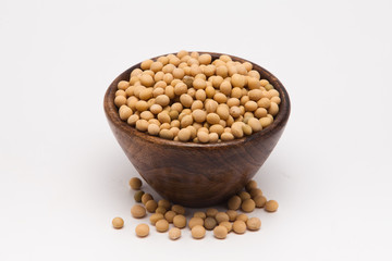  Soybean in wooden bowl on white background