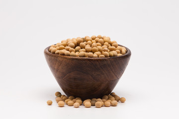 Fototapeta na wymiar Soybean in wooden bowl on white background