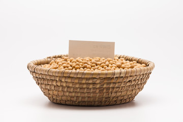 Fototapeta na wymiar Blank paper with Soybeans in basket isolated on white background