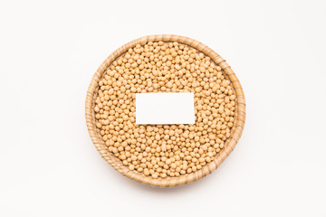 Blank paper with Soybeans in basket isolated on white background