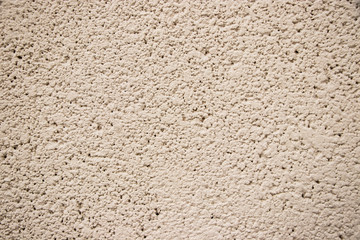 Fototapeta premium Beige stucco wall texture medium