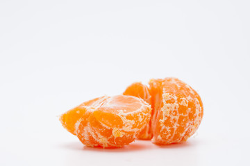 Peeled tangerine or mandarin orange isolated on white background