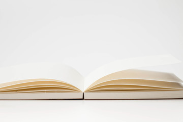 Open book pages on white background 