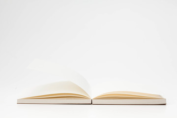 Open book pages on white background 