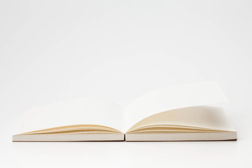 Open book pages on white background 