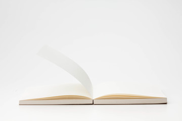Open book pages on white background 