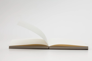 Open book pages on white background 