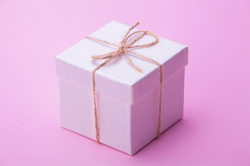 Gift box on pink background