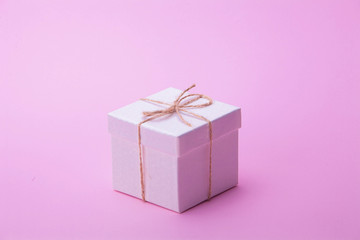 Gift box on pink background