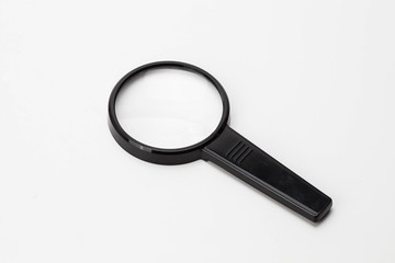 Magnifying glass on white background 