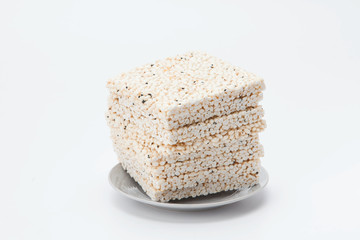 Pile of korean rice crackers isolated on white background