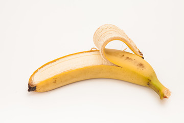 Peel banana on white background