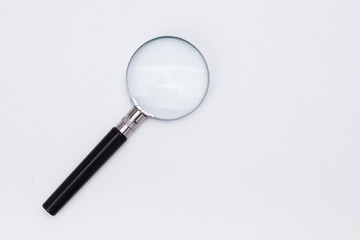 Magnifying glass Loupe on white backdrop