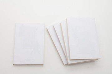 Stack of books on white background