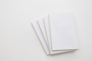 Stack of books on white background