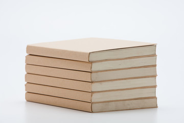  Stack of brown books isolated 
