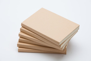  Stack of brown books isolated 