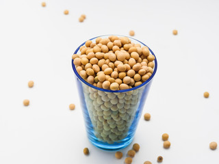  Dried soy beans in glass cup isolated