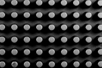 Macro image of a rubber coin mat