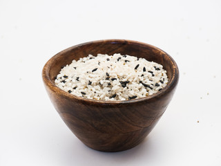 Miscellaneous grains, rice, black rice, brown rice in wooden bowl isolated