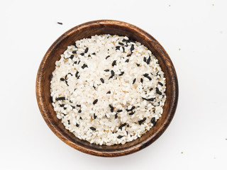 Miscellaneous grains, rice, black rice, brown rice in wooden bowl isolated