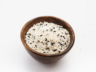 Miscellaneous grains, rice, black rice, brown rice in wooden bowl isolated