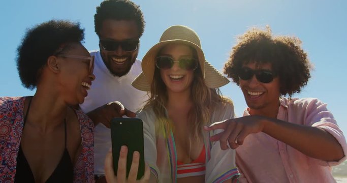 Group friends taking selfie with phone 4k