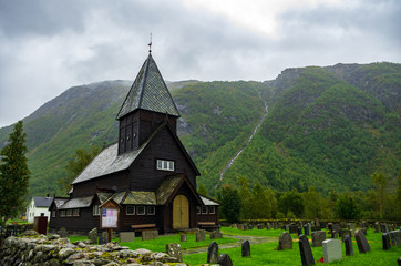 Small and black viking church in Norway