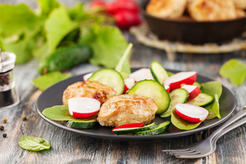 Meat cutlets and vegetables