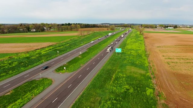 Aerial view of Pennsylvania state highway 222, road sign reads Oregon Pike exit in 1 mile, major highway in America