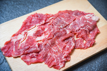 Meat beef slice on wooden cutting board for cooked or Sukiyaki Shabu shabu Japanese foods Asian cuisine - Fresh beef raw