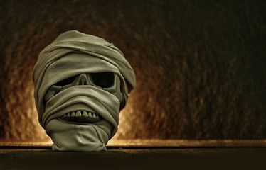 Skull wrapped in bandages like mummy