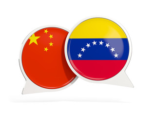 Fototapeta premium Flags of China and venezuela inside chat bubbles