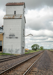 Fototapeta na wymiar Railroad and old grain elevator