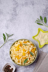 Pasta with slices of yellow pepper
