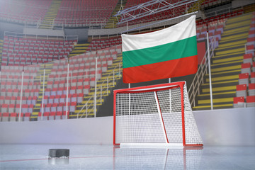Flag of Bulgaria in hockey arena with puck and net