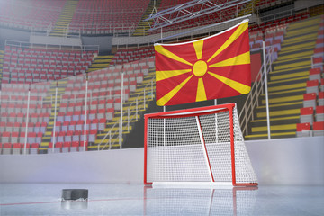 Flag of Macedonia in hockey arena with puck and net